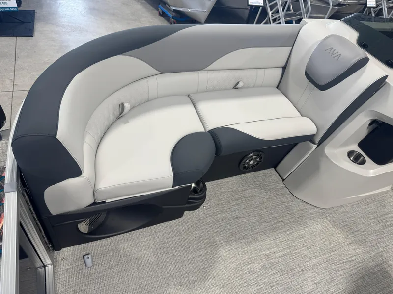 Slide: The Image of 2025 Avalon LSZ Quad Lounger Shift boat seating, featuring sleek gray and white upholstery. - 3