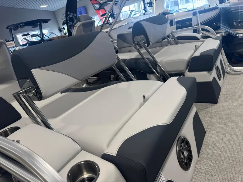 Slide: The Image of 2025 Avalon LSZ Quad Lounger Shift boat interior with luxurious seating and modern design. - 8