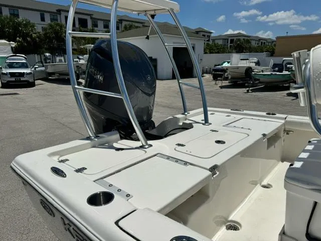 Slide: The Image of 2026 Key West 210 Bay Reef boat with Yamaha engine, docked under clear blue sky. - 8
