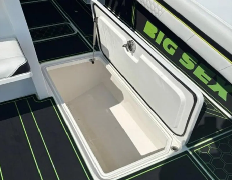 Slide: The Image of Open storage compartment on 2020 Prowler 42 boat deck. - 27