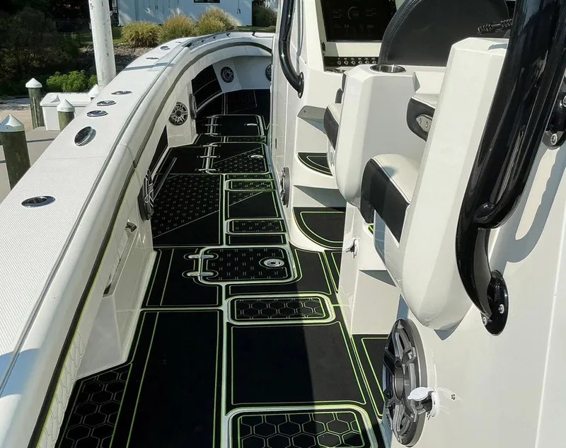 Slide: The Image of 2020 Prowler 42 boat interior with sleek seating and modern design elements. - 28