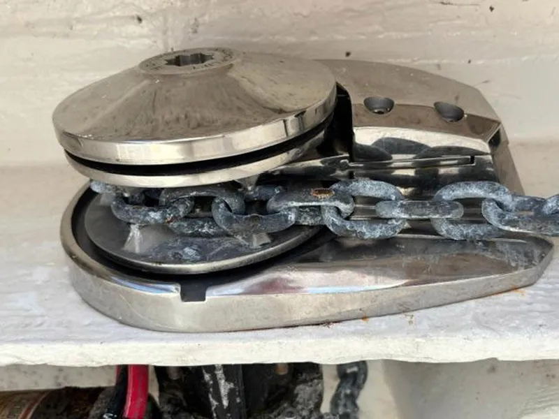 Slide: The Image of Anchor windlass on a 2020 Prowler 42 boat, featuring a metal chain. - 32