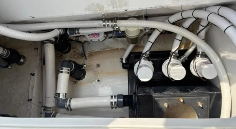 Slide: The Image of Bilge compartment of 2020 Prowler 42 boat with hoses and fittings. - 35