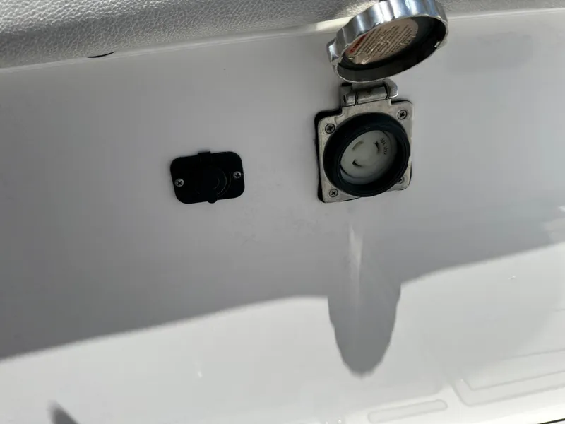 Slide: The Image of 2023 Sea Fox 368 Commander boat interior with control panel and cup holder. - 26