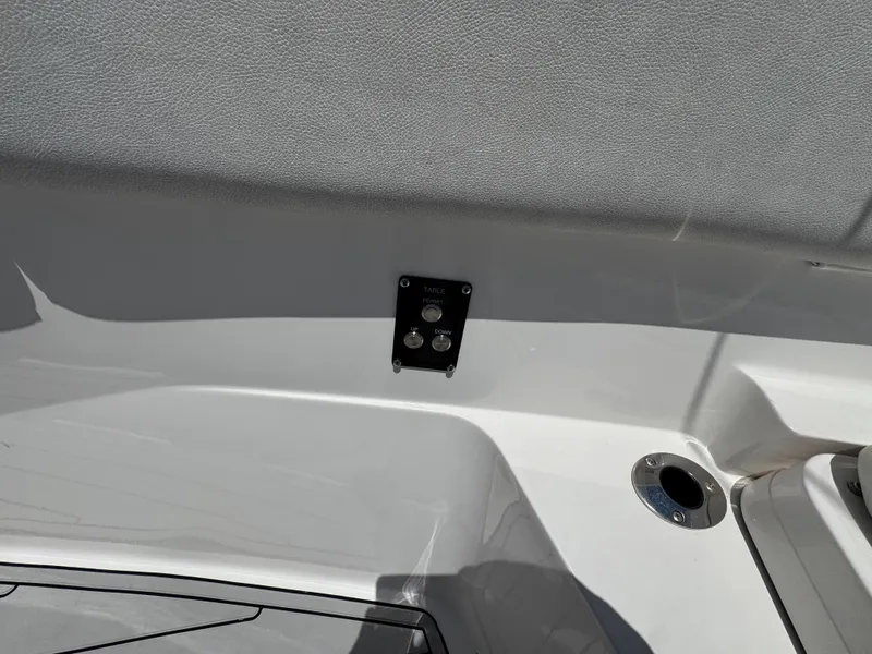 Slide: The Image of Interior view of 2023 Sea Fox 368 Commander boat with control panel and storage area. - 27