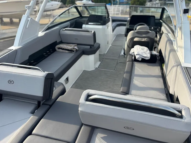 Slide: The Image of 2024 Cobalt R8 Outboard boat interior with spacious seating and modern design. - 19