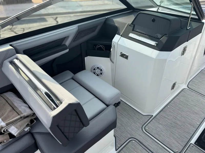 Slide: The Image of 2024 Cobalt R8 Outboard interior with sleek seating and modern dashboard design. - 22