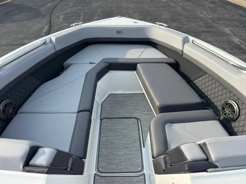 Slide: The Image of 2024 Cobalt R8 Outboard boat interior with gray seating and modern design. - 32