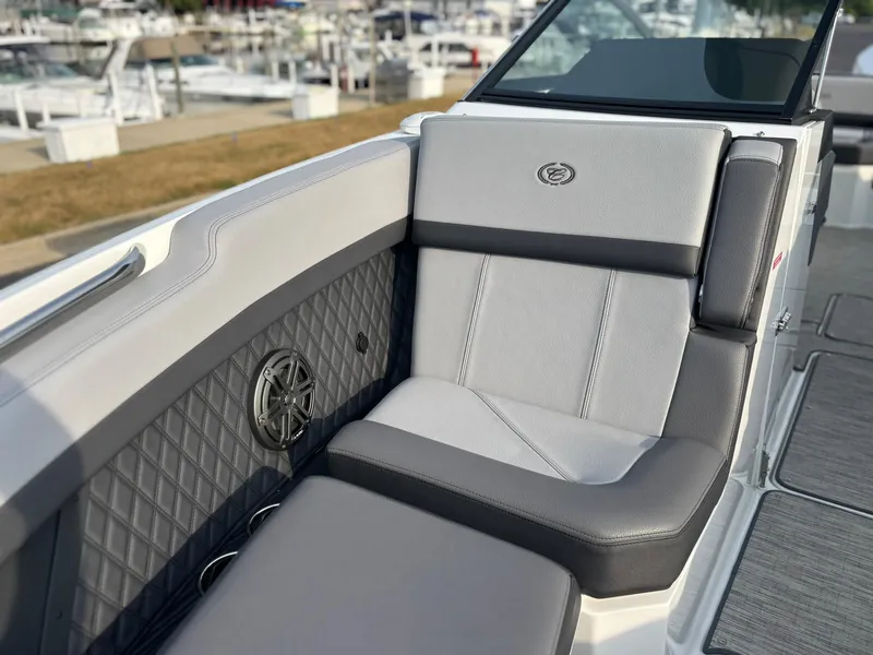 Slide: The Image of 2024 Cobalt R8 Outboard boat interior with luxurious seating and speaker detail. - 36