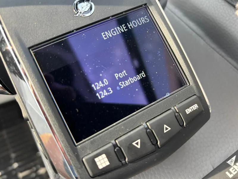 Slide: The Image of 2024 Cobalt R8 Outboard engine hours display showing port and starboard readings. - 44