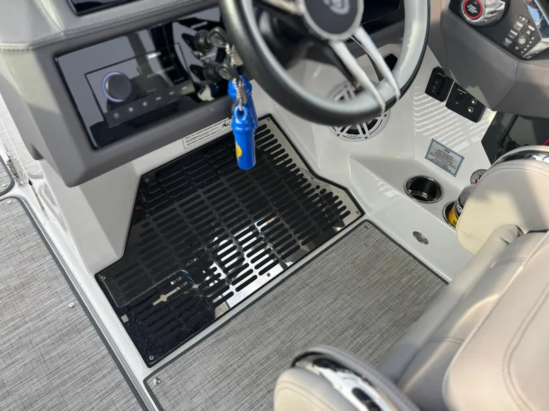 Slide: The Image of 2024 Cobalt R8 Outboard cockpit with steering wheel, controls, and modern dashboard. - 45