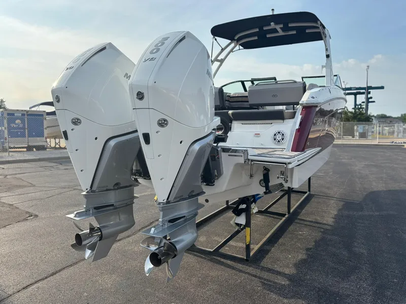 Slide: The Image of 2024 Cobalt R8 Outboard boat with twin engines on display. - 7