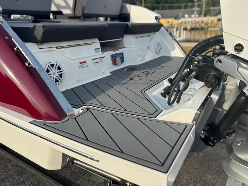 Slide: The Image of 2024 Cobalt R8 Outboard boat with sleek deck design and modern features. - 9