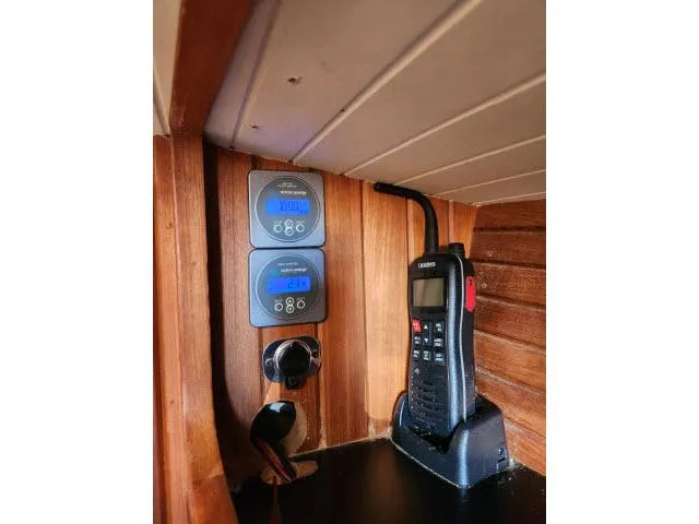 Slide: The Image of Wooden interior of 1983 Hans Christian HC33 with radio and digital displays. - 17