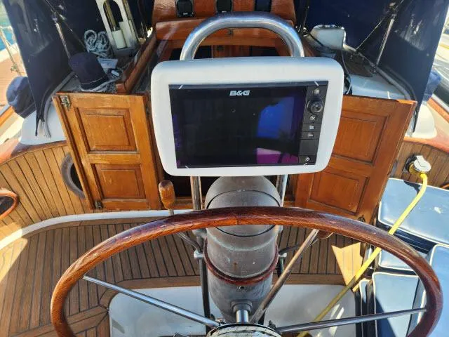 Slide: The Image of Steering wheel and navigation system on 1983 Hans Christian HC33 sailboat. - 34