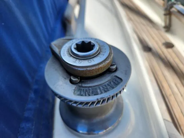 Slide: The Image of Winch on 1983 Hans Christian HC33 sailboat deck, close-up view. - 36