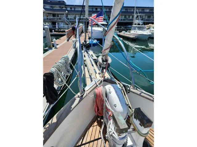 Slide: The Image of Sailboat docked at marina, Hans Christian HC33, 1983 model, with American flag. - 40
