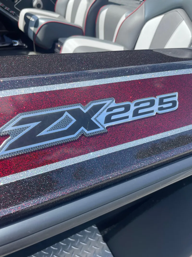 Slide: The Image of 2020 Skeeter ZX 225 boat interior with logo and seating detail. - 11