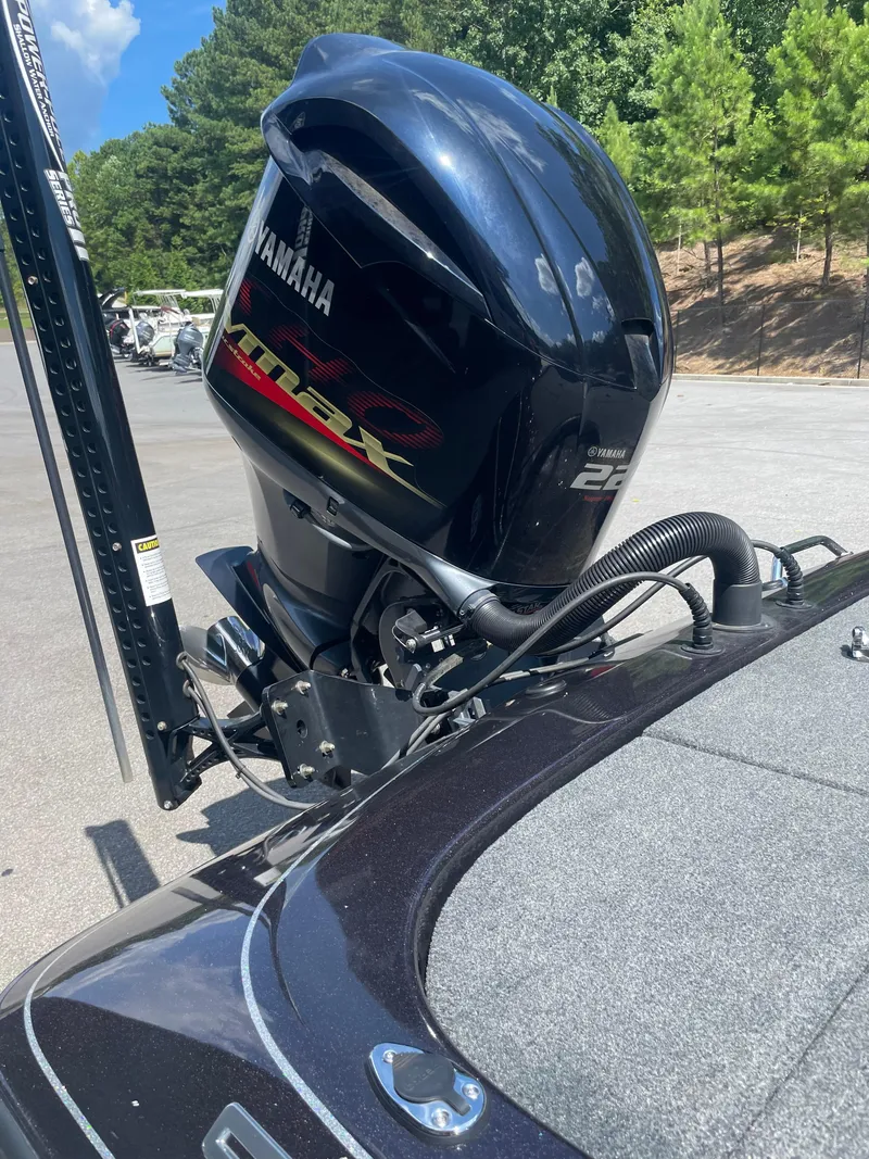 Slide: The Image of 2020 Skeeter ZX 225 boat with Yamaha VMAX engine, parked outdoors. - 15
