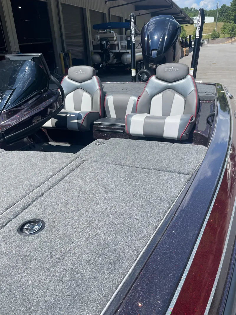 Slide: The Image of 2020 Skeeter ZX 225 boat interior with dual seats and carpeted deck. - 5