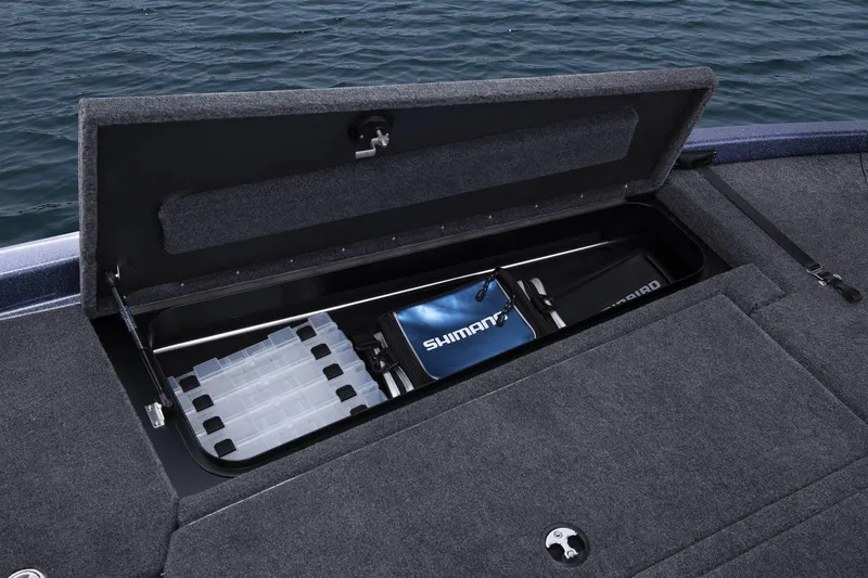 Slide: The Image of Manufacturer Provided Image: 2020 Skeeter ZX 225 boat storage compartment with fishing gear. - 8