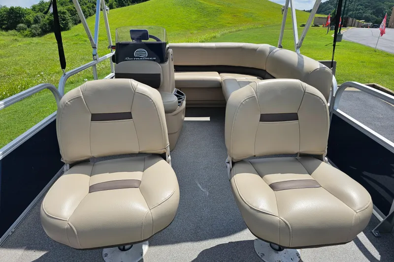 Slide: The Image of 2019 Sun Tracker Bass Buggy 16 DLX pontoon boat interior with beige seating. - 6