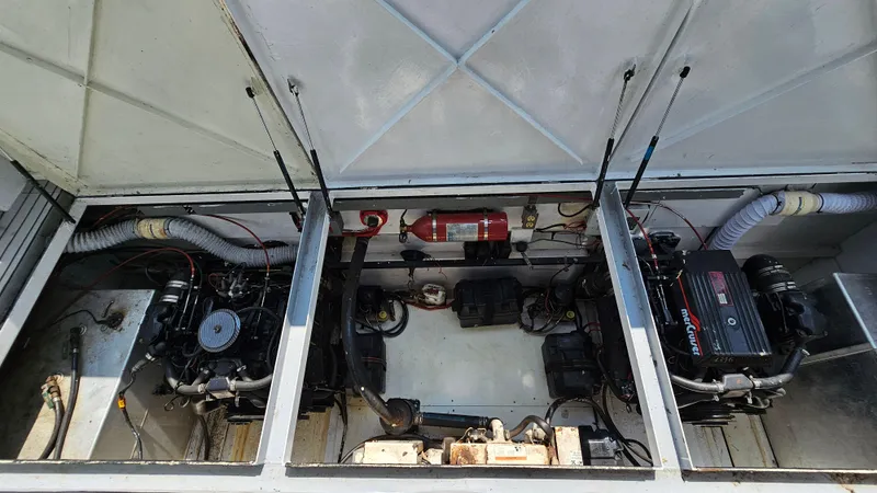 Slide: The Image of Engine compartment of a 1993 Skipperliner 47 SL with visible mechanical components. - 35