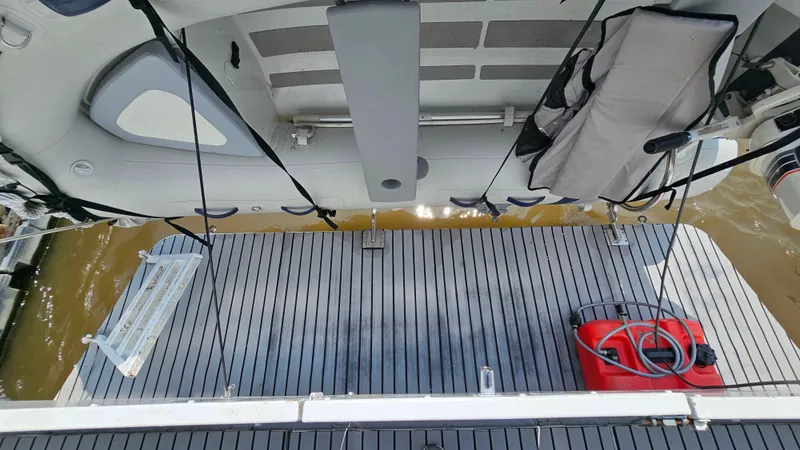 Slide: The Image of 1993 Skipperliner 47 SL boat deck with equipment and water view. - 41