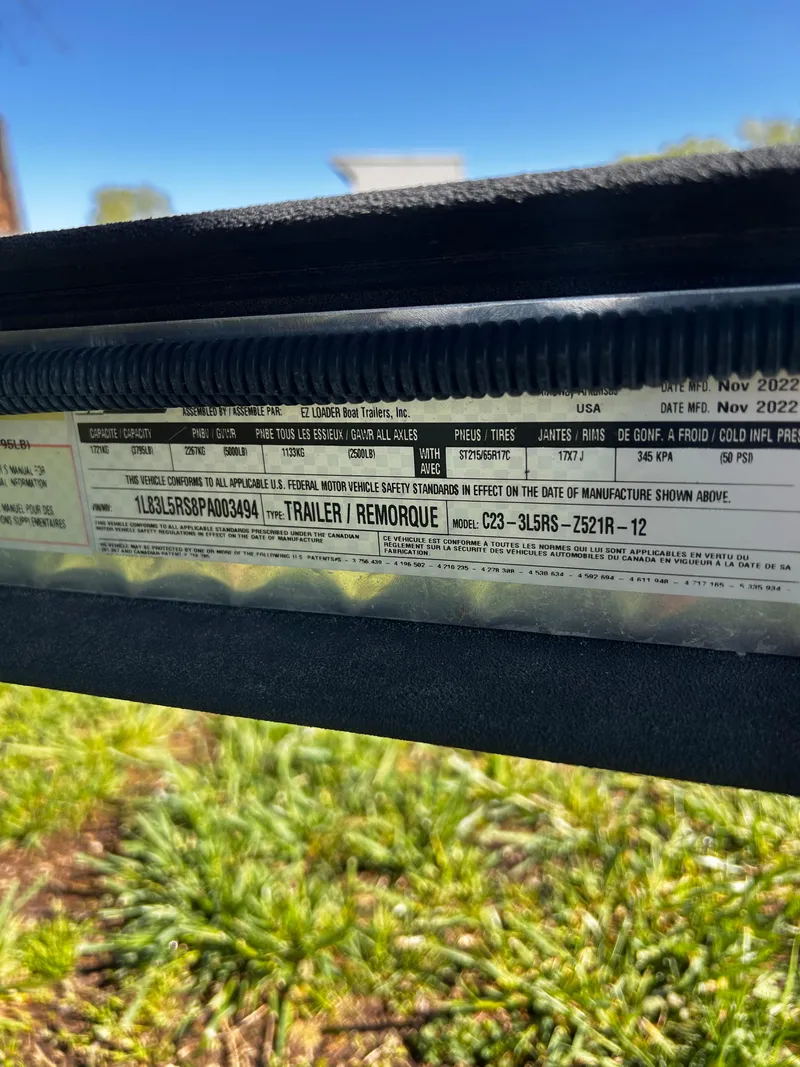Slide: The Image of Label on 2023 Ranger Z521R Ranger Cup Equipped trailer, showing specifications and manufacturing details. - 2