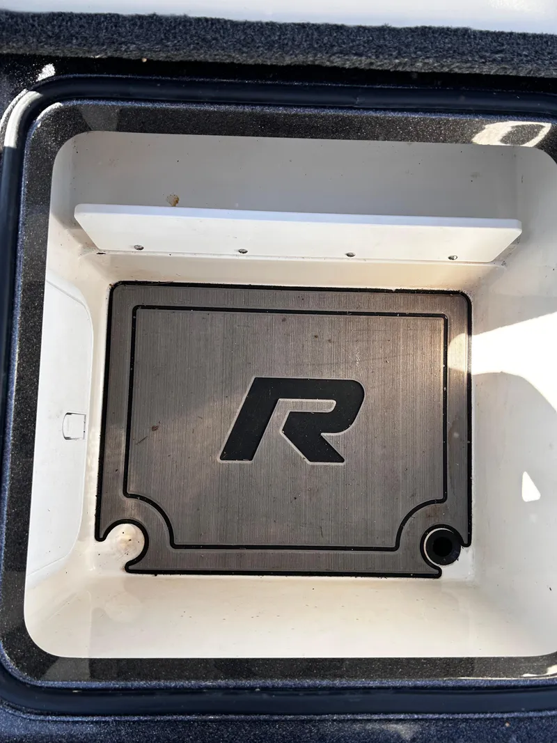Slide: The Image of 2023 Ranger Z521R Ranger Cup Equipped storage compartment with logo. - 26
