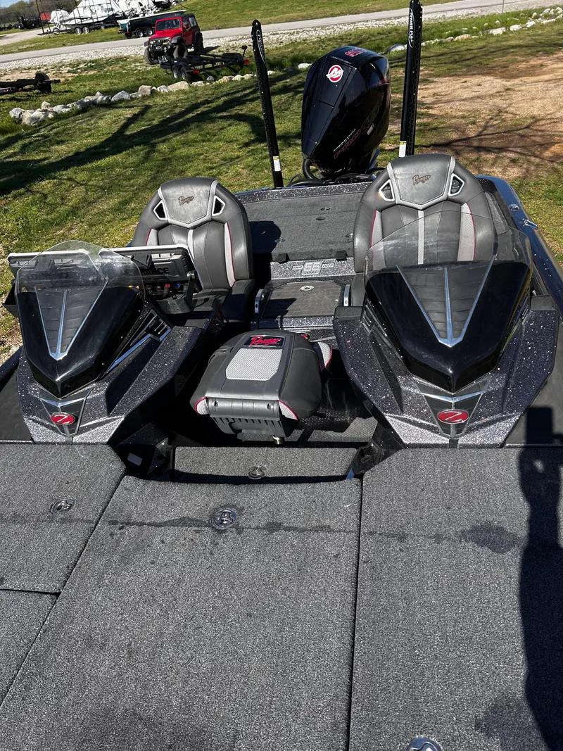 Slide: The Image of 2023 Ranger Z521R Ranger Cup boat interior with dual seats and control panel. - 32