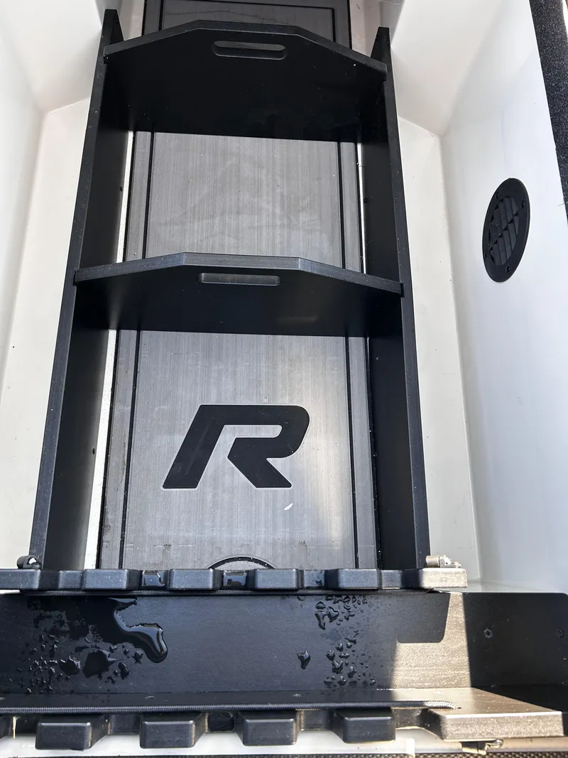 Slide: The Image of 2023 Ranger Z521R Ranger Cup Equipped boat interior with storage compartments. - 37