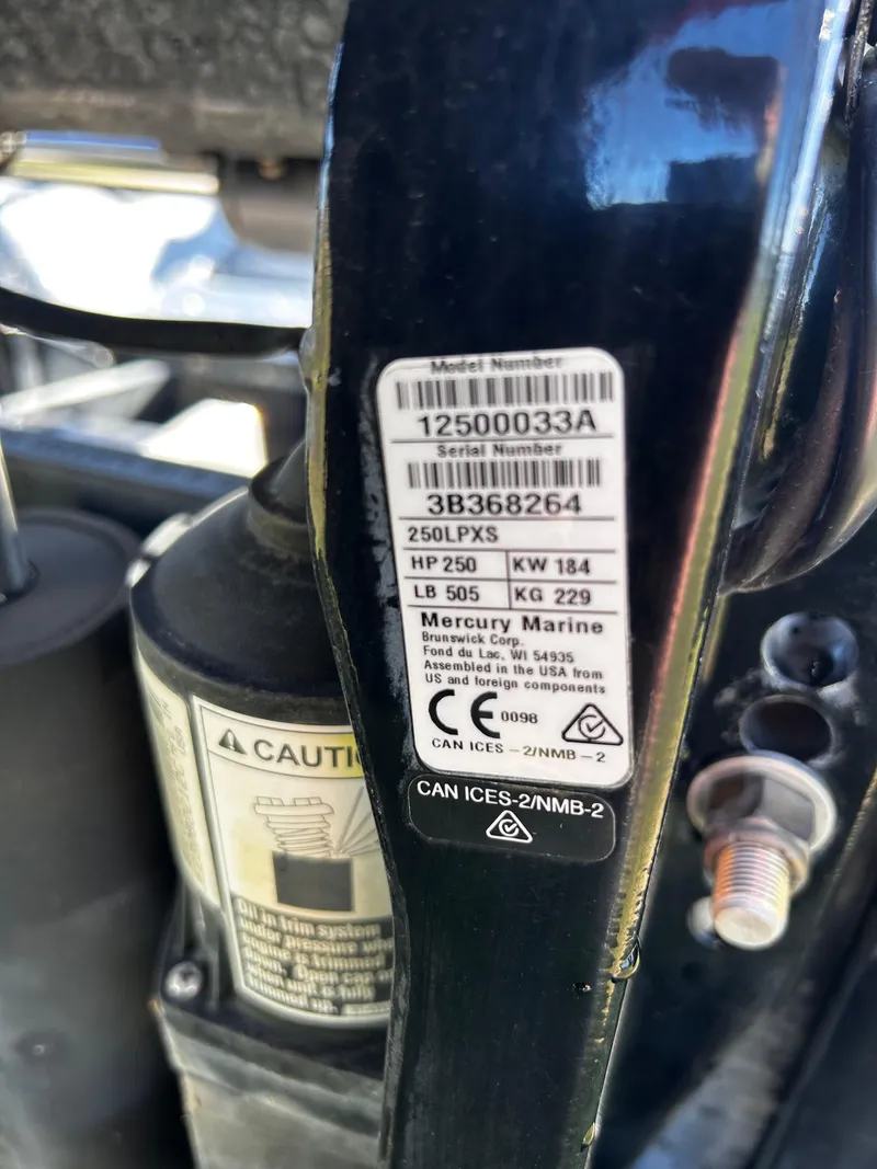 Slide: The Image of Label on 2023 Ranger Z521R boat engine, showing model and serial numbers, horsepower, and weight. - 39