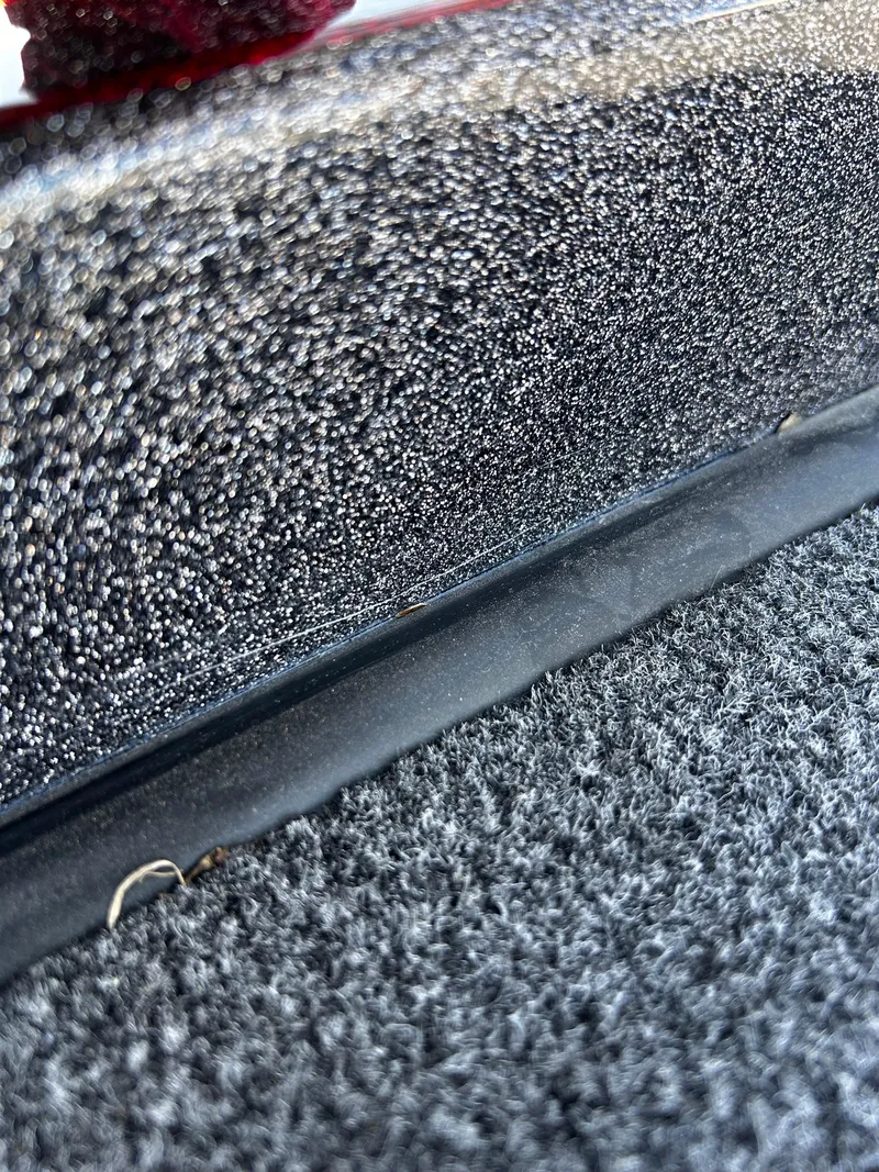 Slide: The Image of Close-up of 2023 Ranger Z521R Ranger Cup Equipped boat's textured surface and carpet. - 7