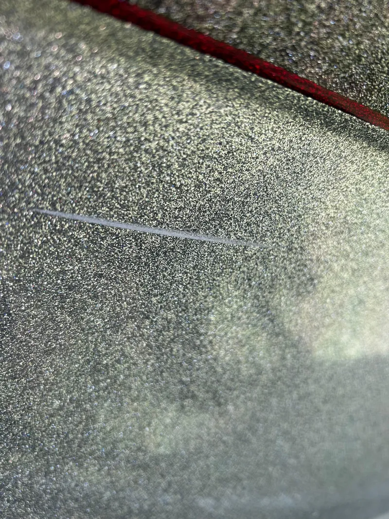 Slide: The Image of Close-up of 2023 Ranger Z521R Ranger Cup Equipped metallic surface with a scratch. - 9