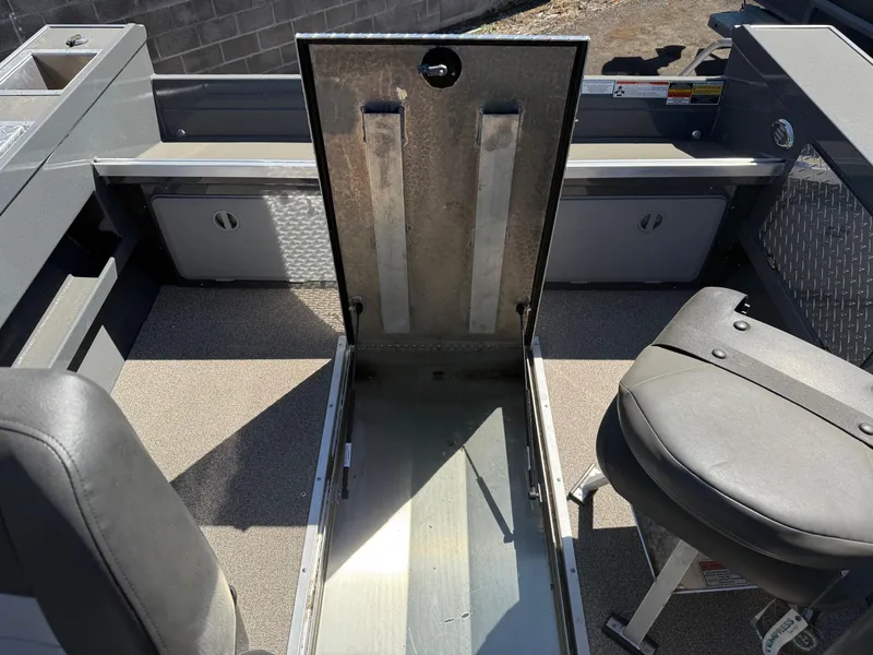 Slide: The Image of Control panel of 2025 Fish Rite River Master 20 boat, featuring RPM and directional buttons. - 14