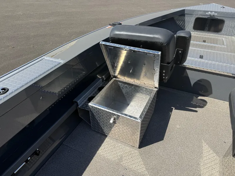 Slide: The Image of Interior of 2025 Fish Rite River Master 20 boat with diamond plate panel. - 8