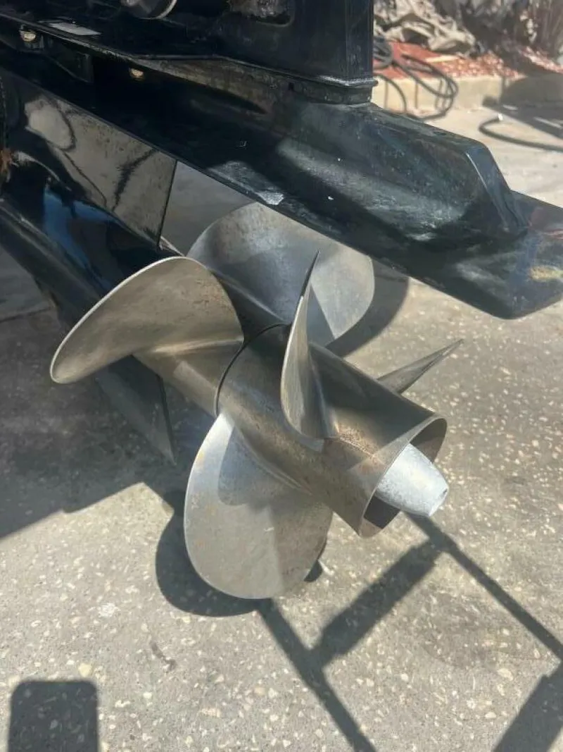 Slide: The Image of 2007 Sea Ray 240 Sundeck boat with black canopy, docked at marina. - 6