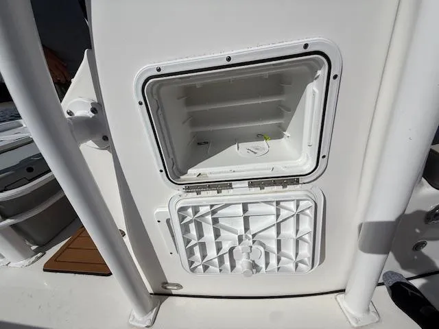 Slide: The Image of Open storage compartment on 2021 Tidewater 2410 Bay Max boat. - 25