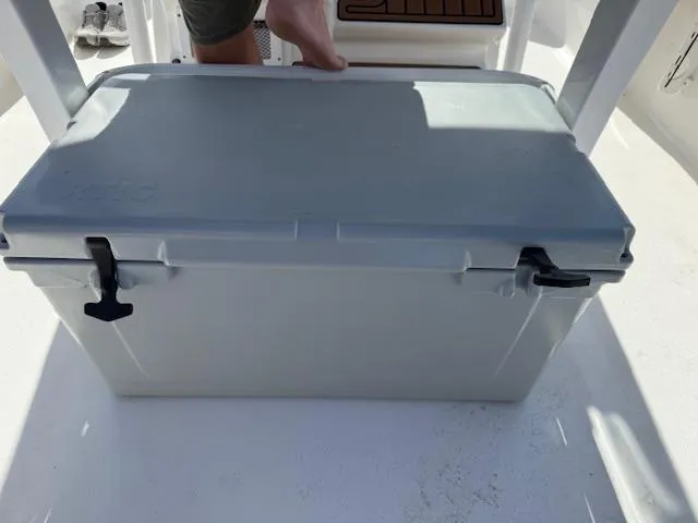 Slide: The Image of Gray cooler on a 2021 Tidewater 2410 Bay Max boat deck. - 48