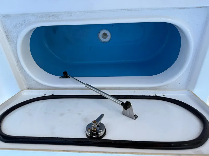 Slide: The Image of Open storage compartment on 2021 Tidewater 2410 Bay Max boat. - 49