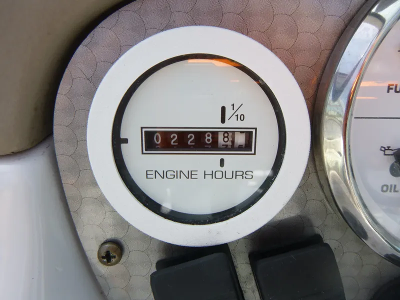 Slide: The Image of Close-up of 2007 Four Winns 180 Horizon engine hours gauge showing 228.8 hours. - 11