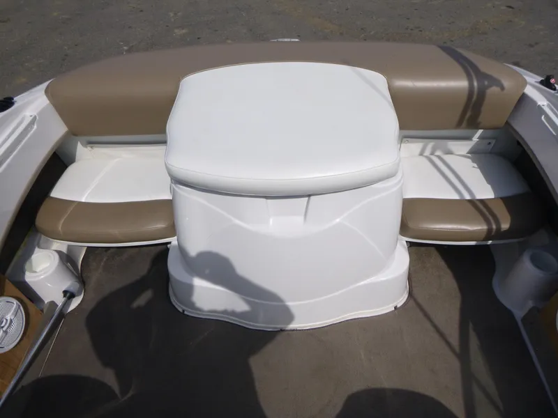 Slide: The Image of 2007 Four Winns 180 Horizon boat interior with beige and white seating arrangement. - 13