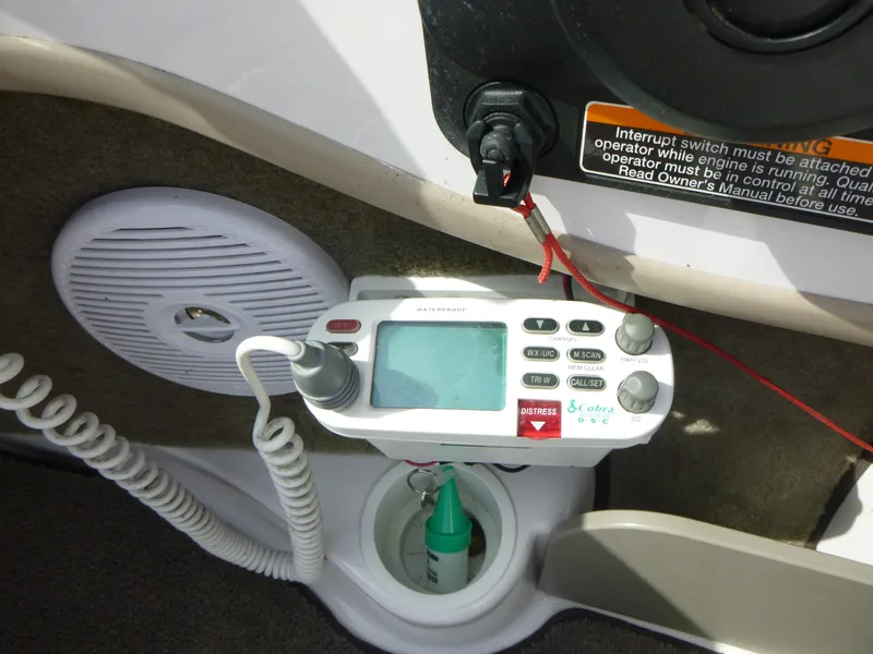 Slide: The Image of 2007 Four Winns 180 Horizon boat dashboard with marine radio and speaker. - 9