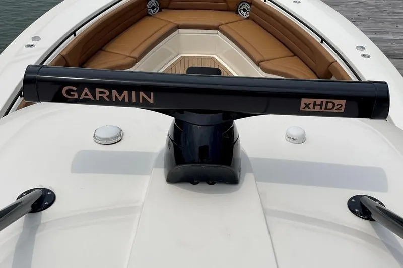 Slide: The Image of 2020 Scout 420 LXF boat with Garmin xHD2 radar and tan seating. - 22