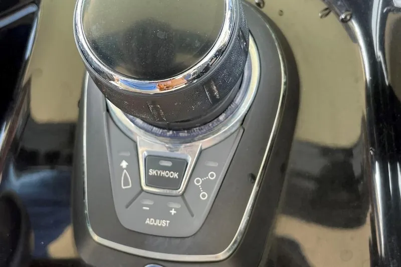 Slide: The Image of Control panel of a 2020 Scout 420 LXF boat featuring Skyhook technology. - 33