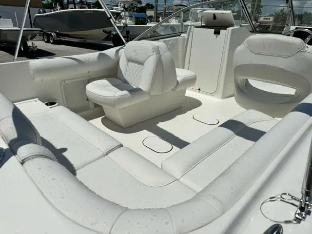 Slide: The Image of 2026 Key West 203 DFS boat interior with white seating and modern design. - 10