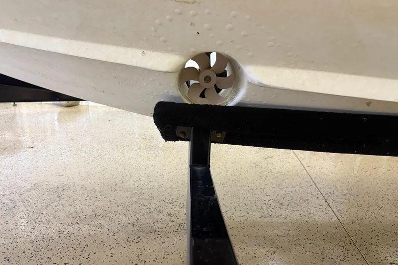 Slide: The Image of Bottom view of a 2000 Intrepid 322 boat hull with a thruster. - 28