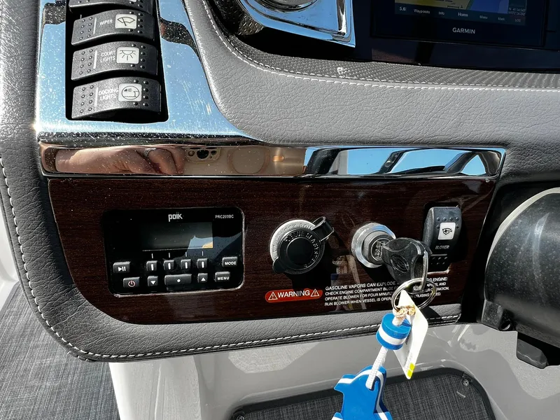 Slide: The Image of Control panel of 2018 Chaparral 257 SSX boat with ignition and switches. - 20