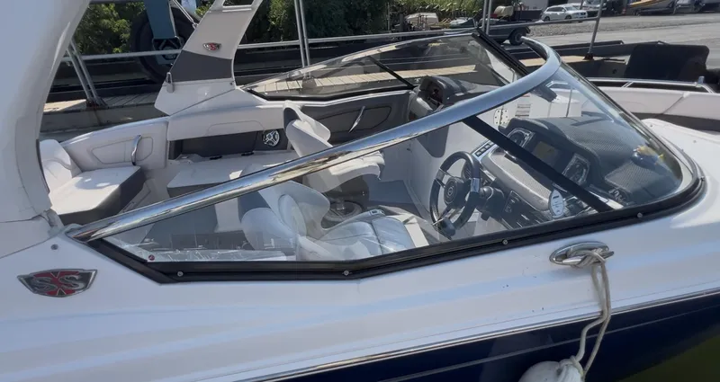 Slide: The Image of 2018 Chaparral 257 SSX boat interior with sleek design and modern dashboard. - 4